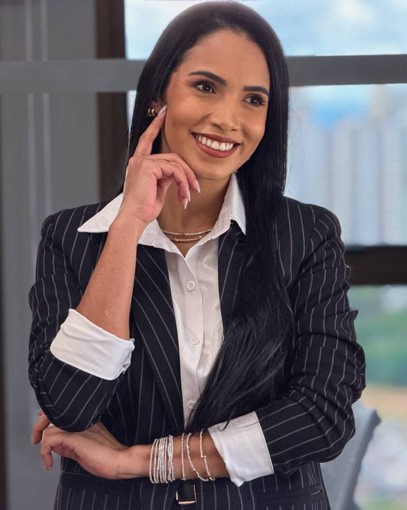 Karisa E. Assunção